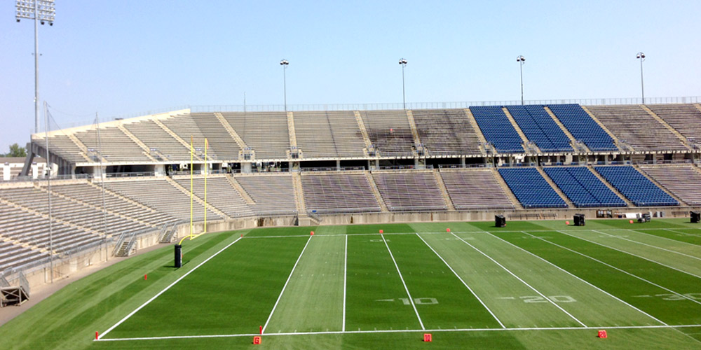 photo of power washing progress across a set of stadium seating