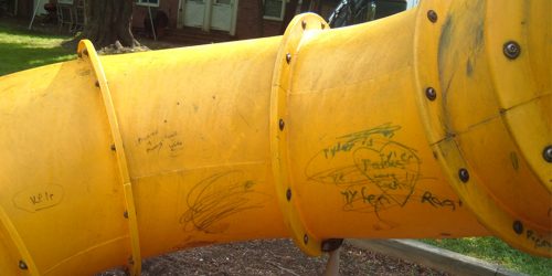 graffiti on plastic playground equipment