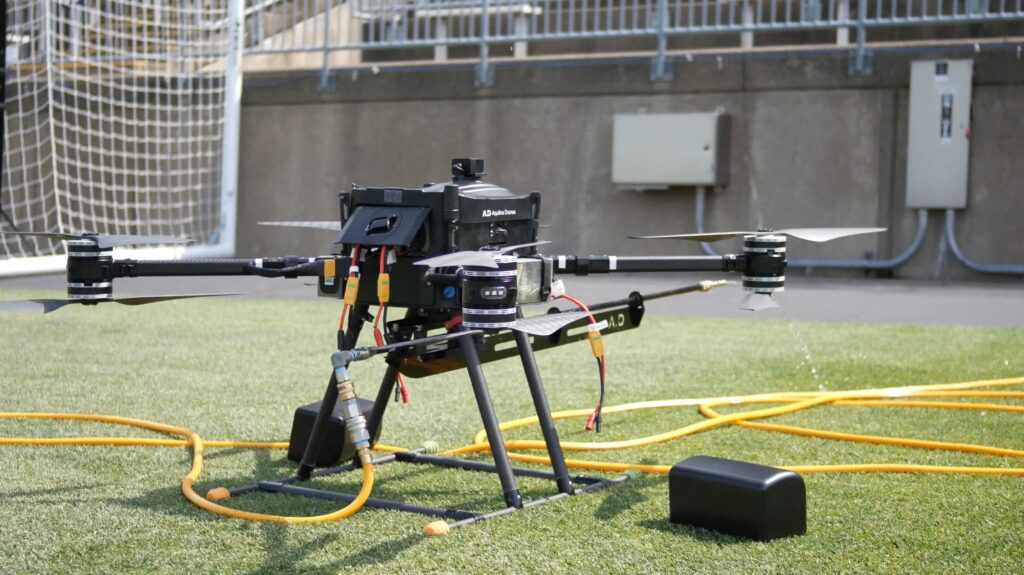 photograph of the OFF THE WALL window cleaning drone before takeoff