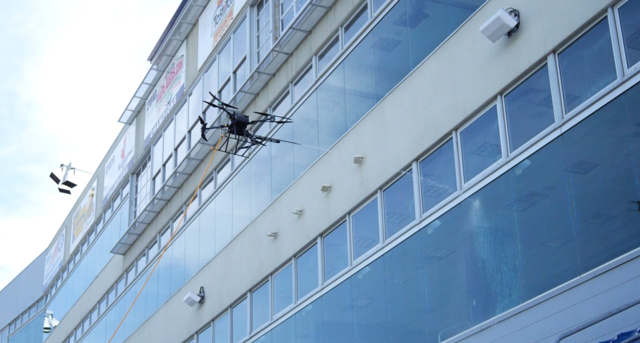 image of a cleaning drone cleaning the windows at Rentschler Field in East Hartford, CT