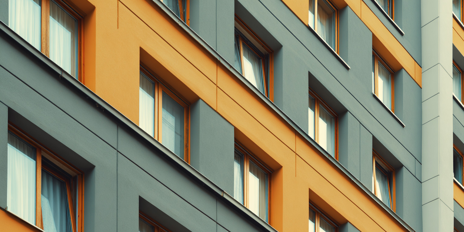 image of a large apartment building with many windows